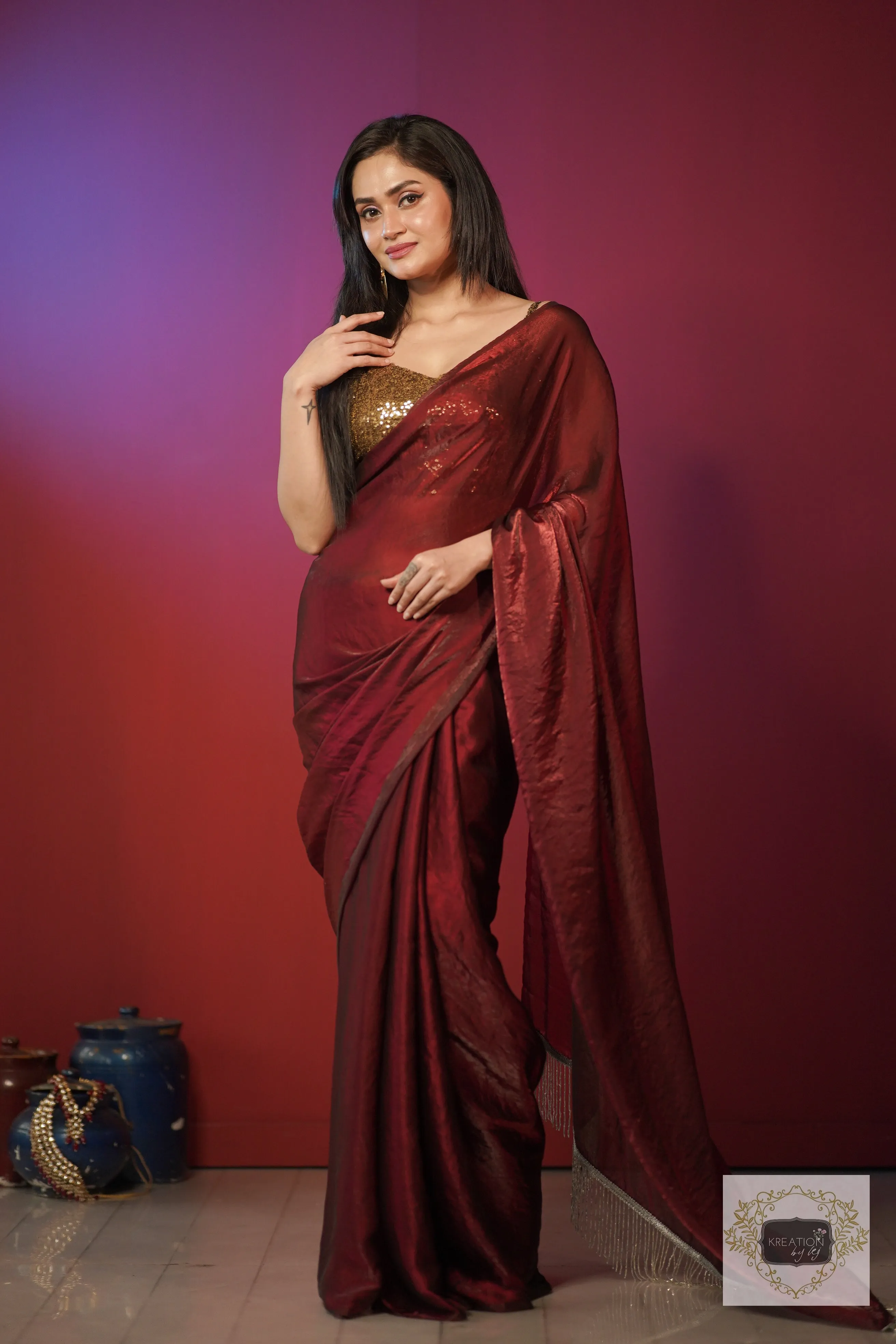 Cheery Wine Shimmer Satin Saree with Hand made Tassels on Pallu