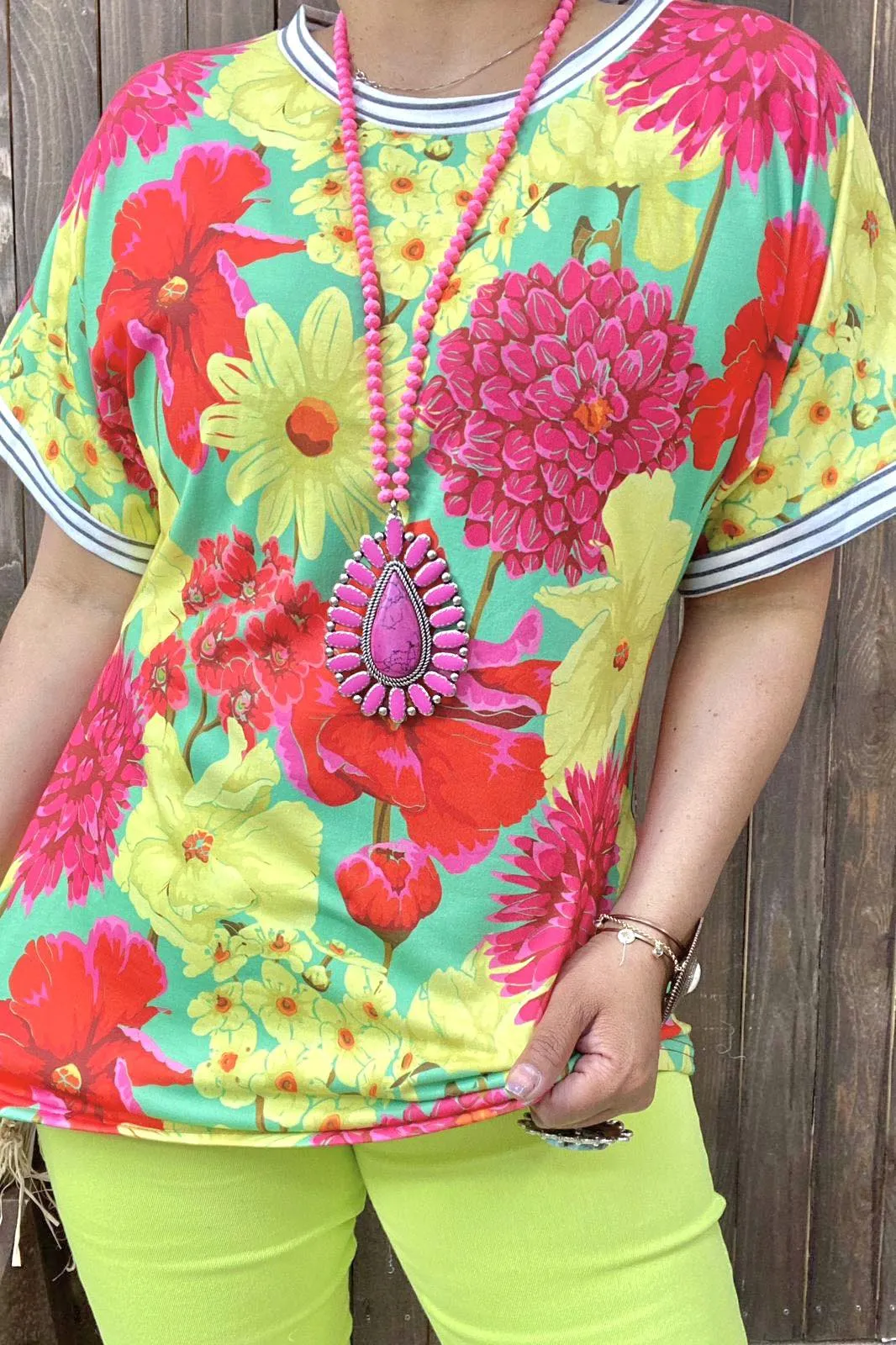 Neon floral top with striped trim